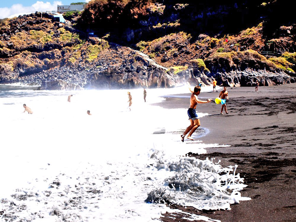 Fun in the Surf at Playa Bollullo 